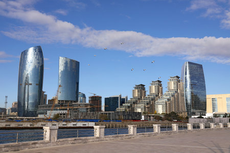 baku city. Azerbaijan. 11.28.2020 Boulevard of the White City near the sea station.のeditorial素材