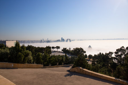 baku city. Azerbaijan. 05.16.2021 year. Fog creeping through the city.のeditorial素材