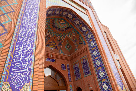 Ganja. Azerbaijan. 07.28.2021. The main entrance to the beautiful mosque Imam-zadeh Mausoleum in the city center.のeditorial素材