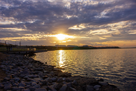 Baku. Azerbaijan. 03.23.2020. People walk by a beautiful lake near the Koroglu metro station.のeditorial素材