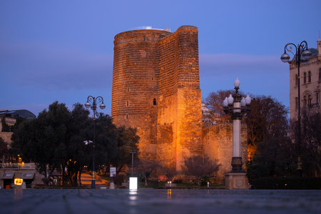 Baku. Azerbaijan. 12.21.2020 year. Maiden's Tower at sunrise in the city center next to the boulevard.のeditorial素材