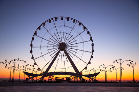Baku. Azerbaijan. 12.28.2020 Ferris wheel at sunrise.のeditorial素材