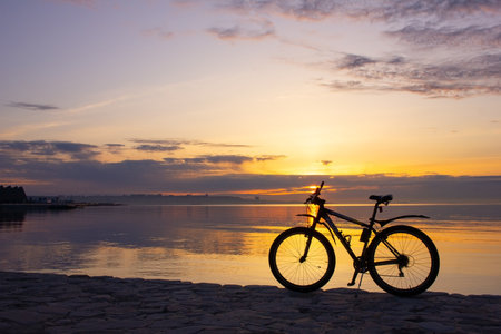 Baku. Azerbaijan. 03.24.2020 Bike on the boulevard at sunrise.のeditorial素材