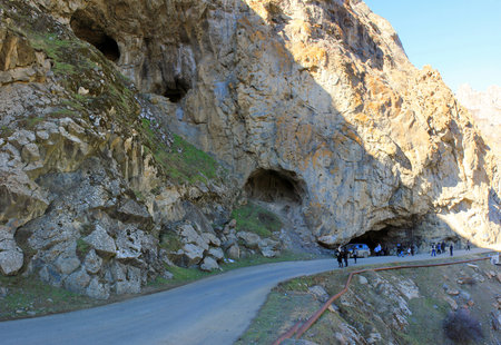Lerik. Masally region. Azerbaijan. 09.25.2016. People in the mountains are watching caves.のeditorial素材