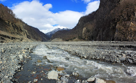 A beautiful river flows from the mountains. Gabala. Azerbaijan.