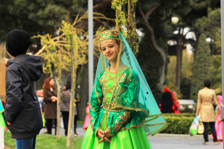 Baku. Azerbaijan. 08/04/2017. A girl in a national costume on a holiday.のeditorial素材