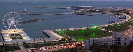 Baku. Azerbaijan. 09.20.2021. Many cars are parked on the road along the embankment during rush hour.のeditorial素材