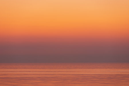 Beautiful red and yellow sky before sunrise. Caspian Sea.の写真素材
