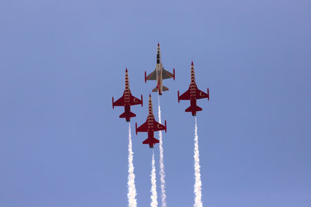 Baku. Azerbaijan. 06/05/2022. Red striped fighters in the air. Technical festival.のeditorial素材