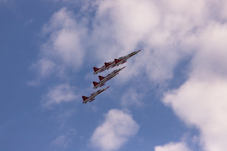 Baku. Azerbaijan. 06/05/2022. Red striped fighters in the air. Technical festival.のeditorial素材