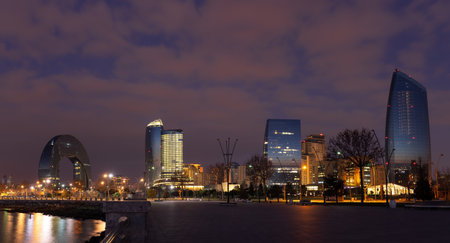 Baku. Azerbaijan. 01.22.2023. Modern buildings in the city center at dawn.のeditorial素材