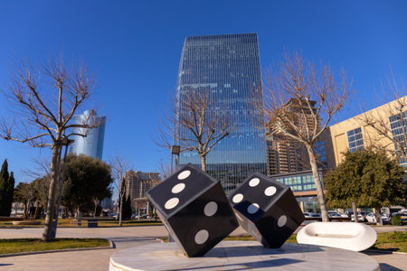 Baku. Azerbaijan. 01.25.2023. Modern large buildings of the city in the Port Baku Park.のeditorial素材