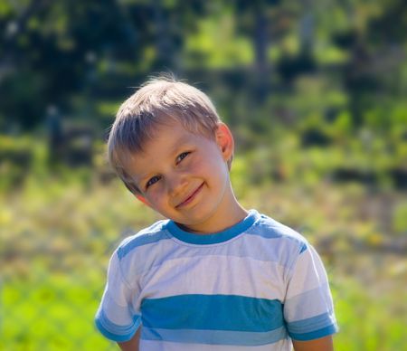 Little boy in garden