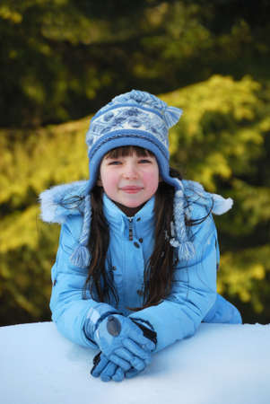 Young Girl Smiling in Winterの写真素材