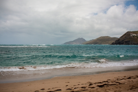 beautiful empty beach o the cloudy dayの写真素材