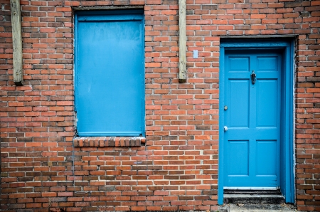 Blue door and windows, brick building, Treme, New Orleans, USAの写真素材