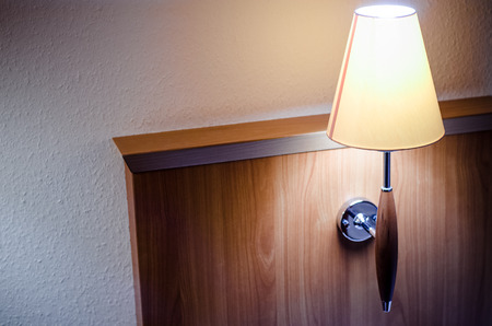 bed with lampの写真素材