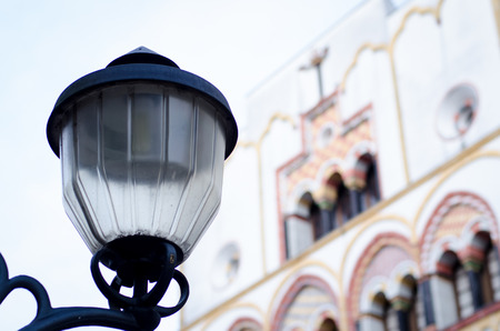street lamp with old house in the backgroundの写真素材
