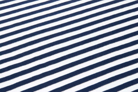 Dark blue and white strips on a fabricの写真素材