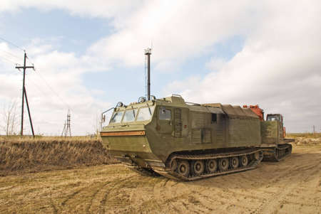 The caterpillar cross-country vehicle on a deposit