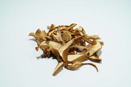 Dried mushrooms bunch on white backround. Species Summer Bolete, perfect for long term storage,...