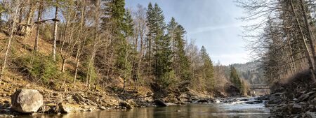 fast mountain river in early springの写真素材
