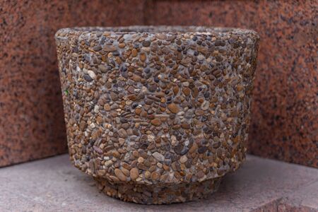 street pot of stone under the flowersの写真素材