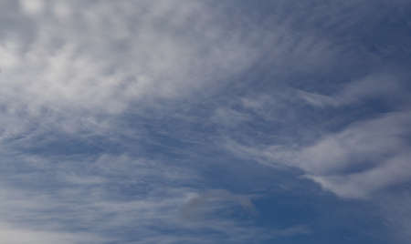 blue sky with smoky cloudsの写真素材
