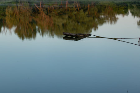 Beautiful landscape with a lake at sunrise in the morningの写真素材