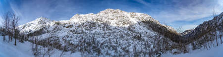 Mountain winter landscape in the Tatras, mountain view covered with snow in frosty sunny weatherの写真素材