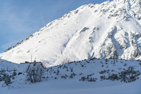 Mountain winter landscape in the Tatras, mountain view covered with snow in frosty sunny weatherの写真素材