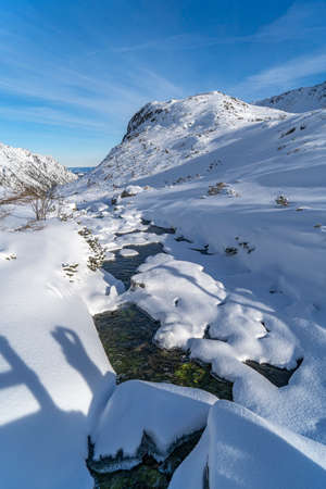 Tatra Mountains, Winter mountain landscape in Tatra mountains, high mountains covered with snow sunny frosty winter weather Polandの写真素材