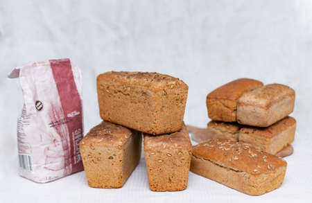 bread baked with rye flour on a white backgroundの写真素材