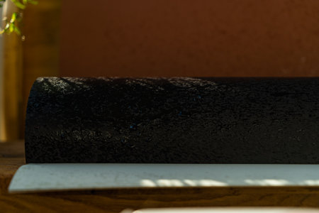 black paper with wet spots from waterの写真素材