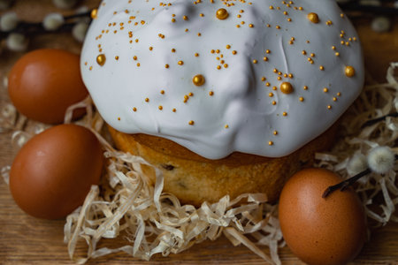 Easter cake and eggs on a wooden background. Happy Easter.の写真素材