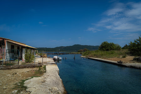 Boat dock in the sea on the island of Corfu, Greeceの写真素材