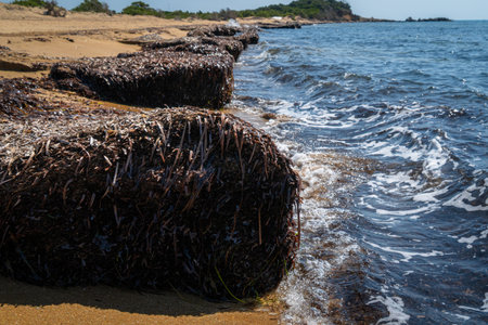 Beautiful seascape with rocks, sea waves and blue sky on Korfu Greeceの写真素材