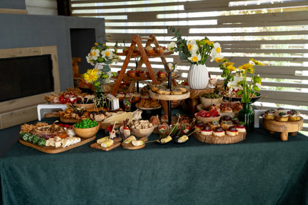 Catering buffet with variety of food snacks and appetizers.の写真素材