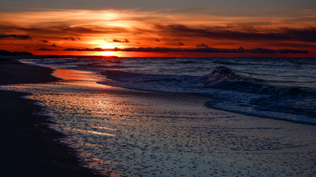Sunset on the beach of the Baltic Sea in Poland, Europeの写真素材