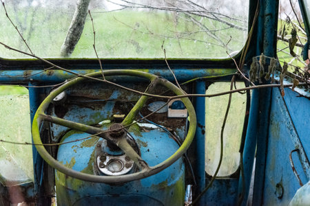 Abandoned old truck in the countryside. Concept of ecology.の写真素材