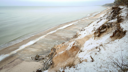 Baltic Sea coast in winter. Sand dunes and snow.の写真素材