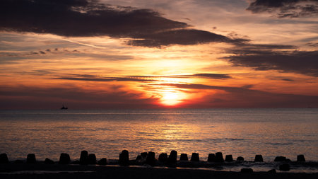 Beautiful sunset over the sea. Dramatic sunset over the sea.の写真素材