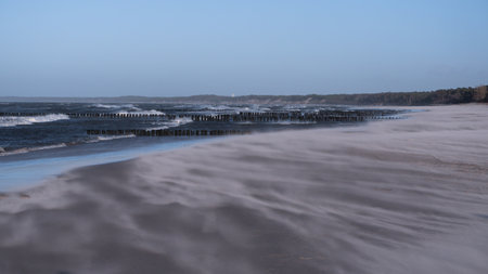 Long exposure of the Baltic Sea coast in winter, Sandstorm, Ustka, Polandの写真素材