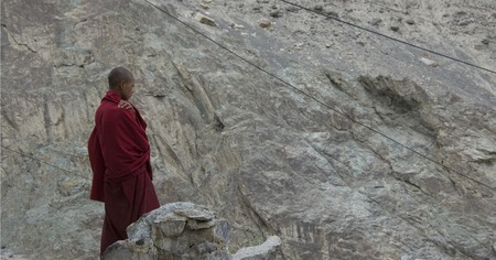 The meditation of a monk near a Ladakh templeの写真素材