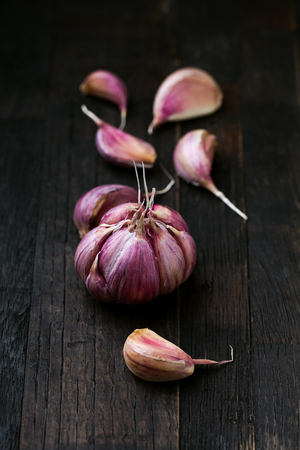 garlic on rustic wooden backgroundの写真素材