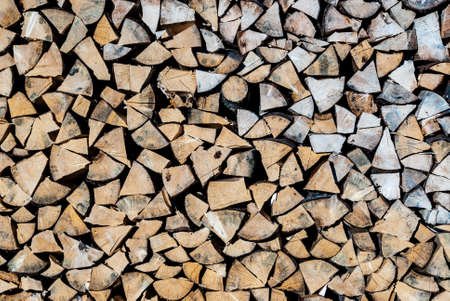 A pile of loose, stacked dry woodの写真素材