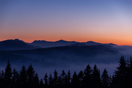 Mountain peaks at sunset in summer, Beskids, Polandの写真素材
