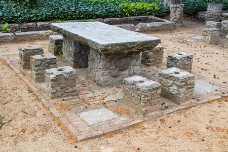 A place to relax in the fresh air. Stone table. Stone seat.の写真素材