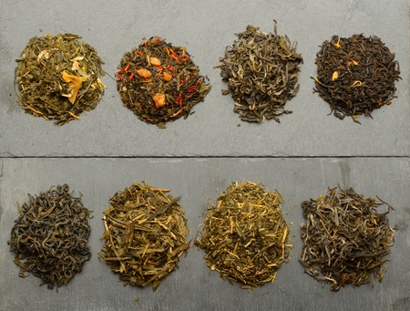 Photo of various kinds of tea Placed on slabs of slateの写真素材