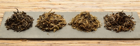 Photo of various kinds of tea Placed on slabs of slateの写真素材